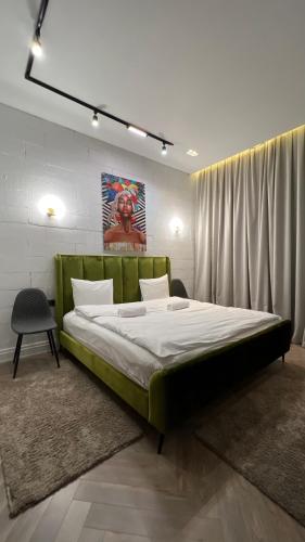 Ένα ή περισσότερα κρεβάτια σε δωμάτιο στο Hotel Manica Esentai City