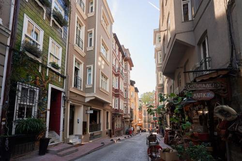a narrow street with buildings in a city at Faik Pasha Hotels Special Category Beyoglu Istanbul in Istanbul