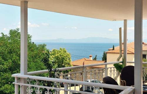 a balcony with a view of the ocean at MARIA NEFELI SEA VIEW in Afitos