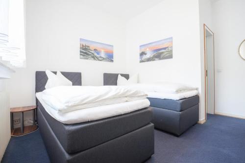 Un ou plusieurs lits dans un hébergement de l'établissement TM Hotel Dortmund Airport