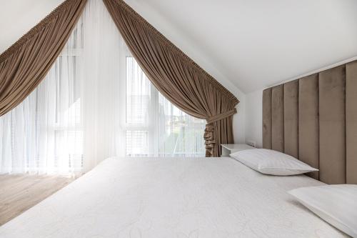 En eller flere senge i et værelse på Sea House 2N