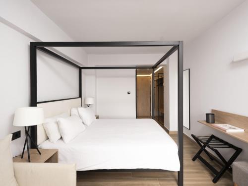 Ein Bett oder Betten in einem Zimmer der Unterkunft Hersonissos Palace
