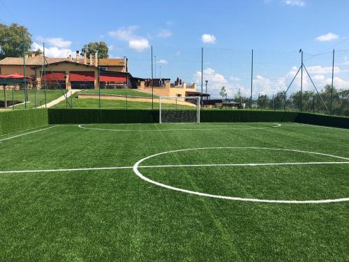 a soccer field with a net on a soccer field at Il Casale Di Roma in Prima Porta