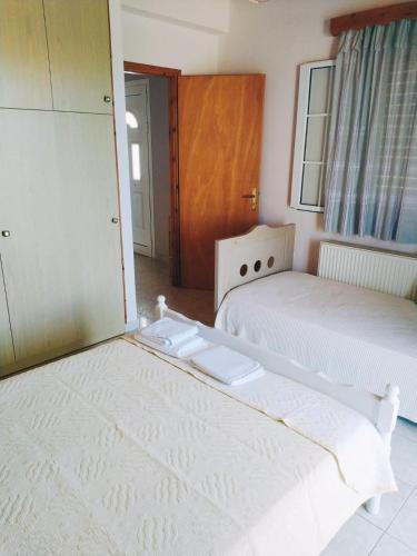 Katil atau katil-katil dalam bilik di Olivo Apartment