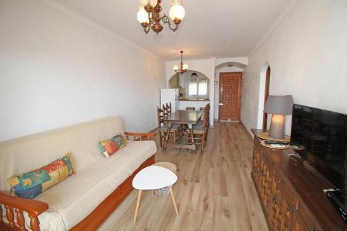 Televízia a/alebo spoločenská miestnosť v ubytovaní Basic Comfort Apartment Port Segre 0169