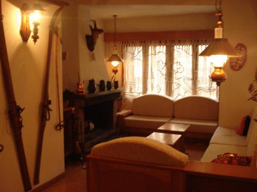 a living room with a couch and a window at Hotel Marxant in Tavascan