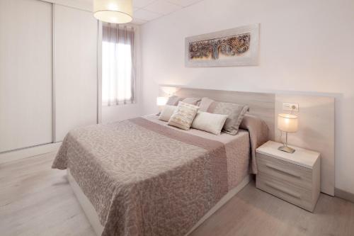 Postel nebo postele na pokoji v ubytování Apartamento Playa Motril Golf