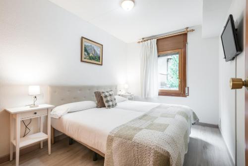 Postel nebo postele na pokoji v ubytování Eth Pradeth by Totiaran en Baqueira a pie de pistas, 5p
