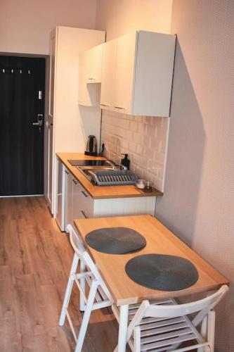 Kuchyň nebo kuchyňský kout v ubytování *Apartamenty Kattowitz 12