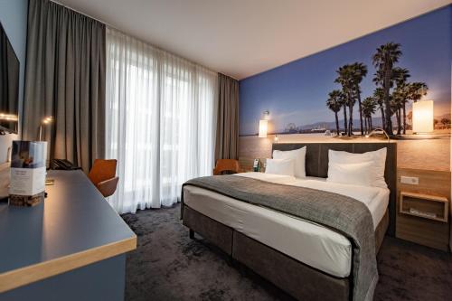 Ein Bett oder Betten in einem Zimmer der Unterkunft Best Western Hotel Wiesbaden