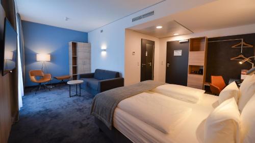 Ein Bett oder Betten in einem Zimmer der Unterkunft Best Western Hotel Wiesbaden
