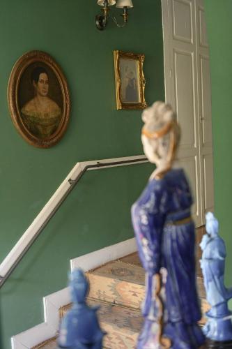 a figurine of a woman walking down a stair case at Hotel Rural Las Longueras in Agaete