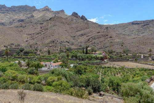 an aerial view of a village in the mountains at Hotel Rural Las Longueras in Agaete