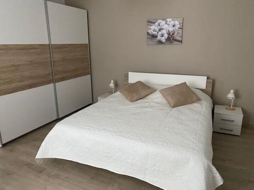 Postel nebo postele na pokoji v ubytování Domaine Au Fil du Temps