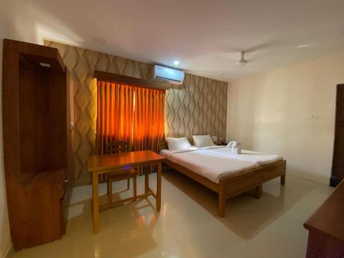 Giường trong phòng chung tại HOTEL BK SAN