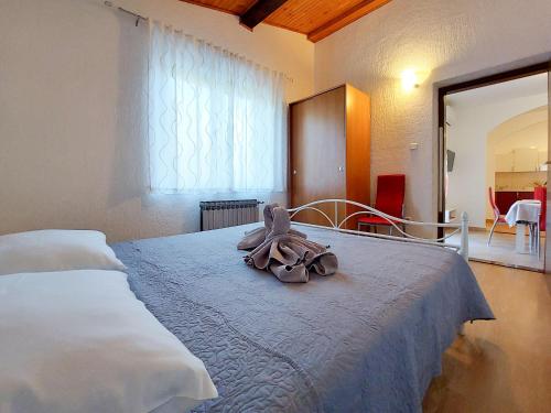 Posteľ alebo postele v izbe v ubytovaní Apartments Nono