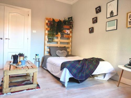 Un pat sau paturi într-o cameră la Apartamento Mavi