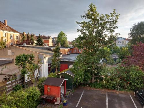 an aerial view of a neighbourhood with a red house at An der Stadthalle in Braunschweig