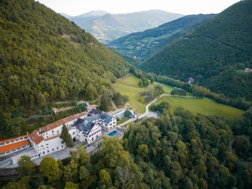 an aerial view of a building in the mountains at Angelats Hotel in Ribes de Freser