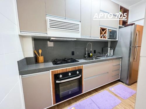 Dapur atau dapur kecil di LINDO NOVISSIMO e PÉ NA AREIA