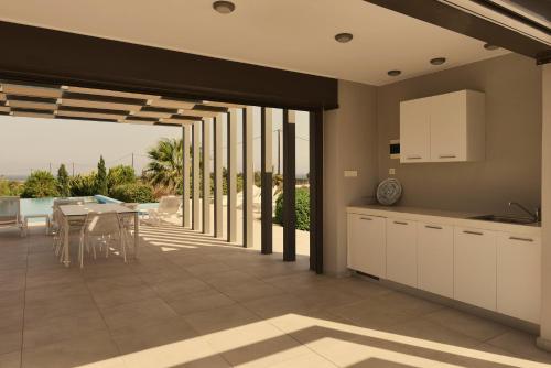 Villa Gardenia, villa de luxe avec piscine à débordement photo 3