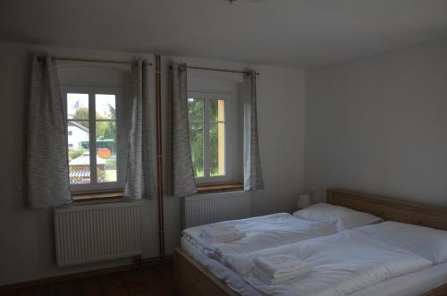 Apartmány U Soptíkaにあるベッド
