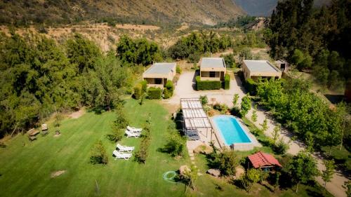 an aerial view of a house with a swimming pool at Lodge del Maipo in San José de Maipo