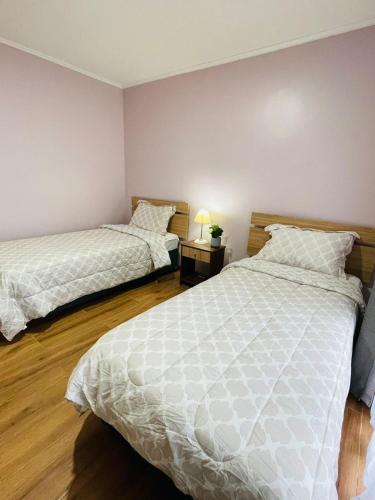Una cama o camas en una habitación de Nido del Arrayán