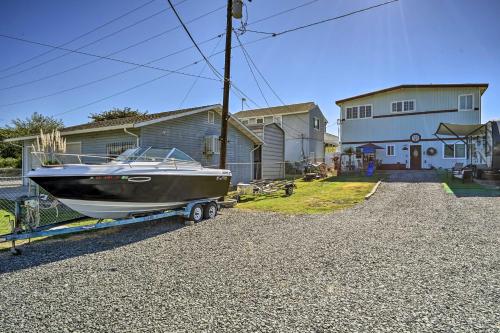 a boat on a trailer in front of a house at Bethel Island Retreat with Private Boat Slip! in Bethel Island