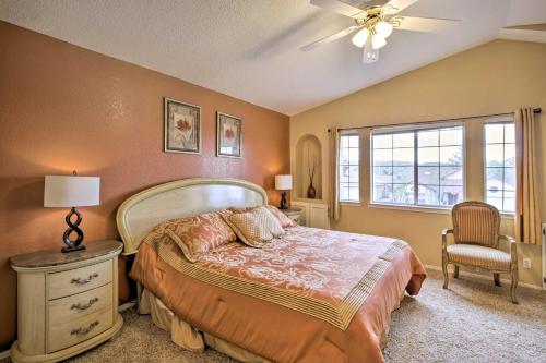 een slaapkamer met een bed en een plafondventilator bij El Paso Retreat with Pool 11 Mi to Downtown! in El Paso