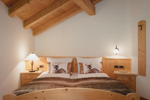 Posteľ alebo postele v izbe v ubytovaní Oberaldoss Residence Wellness