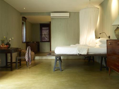 Postel nebo postele na pokoji v ubytování Knai Bang Chatt Resort