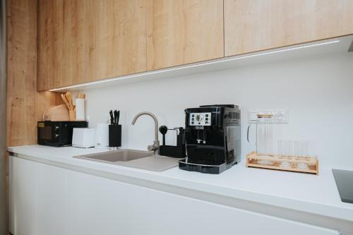 Кухня или мини-кухня в Apartmán Hillside X34, Kubínska Hoľa
