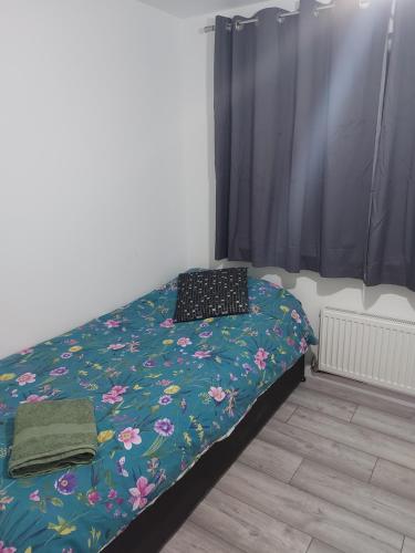 Postel nebo postele na pokoji v ubytování Aaby House in London