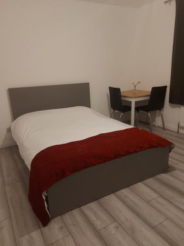 Postel nebo postele na pokoji v ubytování Aaby House in London