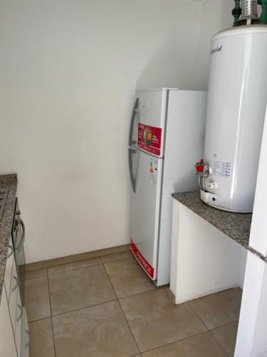 Una cocina o kitchenette en Hermoso Departamento Tipo Loft -Mendoza