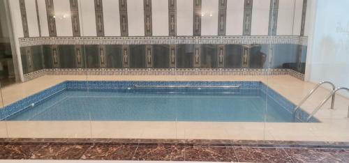 Der Swimmingpool an oder in der Nähe von شاليه فاملي دي family day
