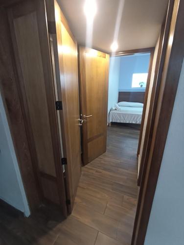 Un ou plusieurs lits dans un hébergement de l'établissement Hotel Posada Comala