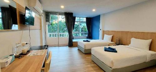 Postel nebo postele na pokoji v ubytování Karon Living Room - SHA Plus