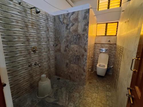 Phòng tắm tại Nandana Home stay