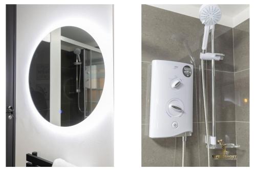 a bathroom with a shower with a mirror at Spacious City Centre Apt Near Cathedral in Exeter