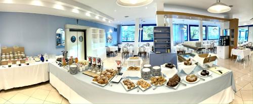 a store filled with lots of different types of food at Hotel Venere in Cesenatico
