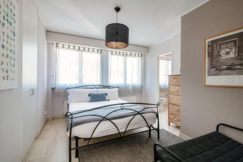 Terrazza Paradiso by Quokka 360 - spacious design flat with terraceにあるベッド