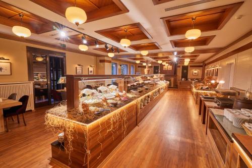 Dedeman Palandoken Ski Lodge Hotel 레스토랑 또는 맛집