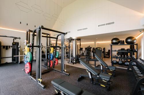 a gym with a lot of machines and weights at Laceby Manor - Spa & Golf Resort in Laceby