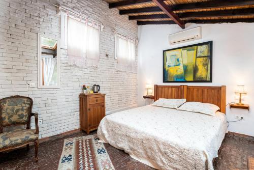 Ένα ή περισσότερα κρεβάτια σε δωμάτιο στο Ephesus Lodge