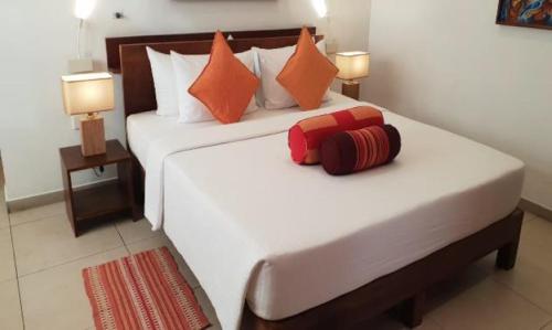 Rockside Cabanas Hotelにあるベッド