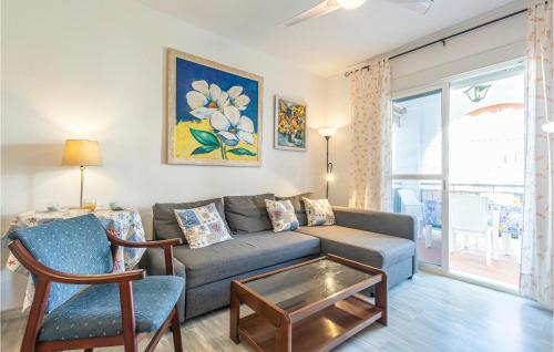 A seating area at 2 Bedroom Nice Apartment In Torrox