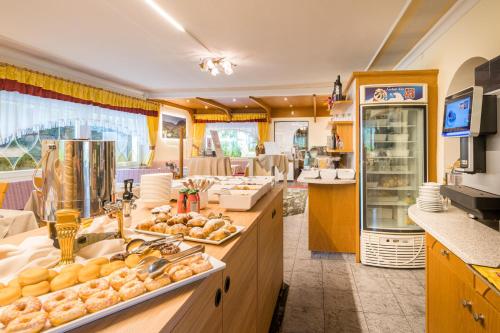 Kuchyň nebo kuchyňský kout v ubytování Ruster Resort