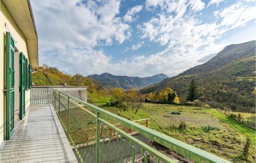 a balcony of a house with a view of the mountains at 4 Bedroom Lovely Home In Codivara in Codivara